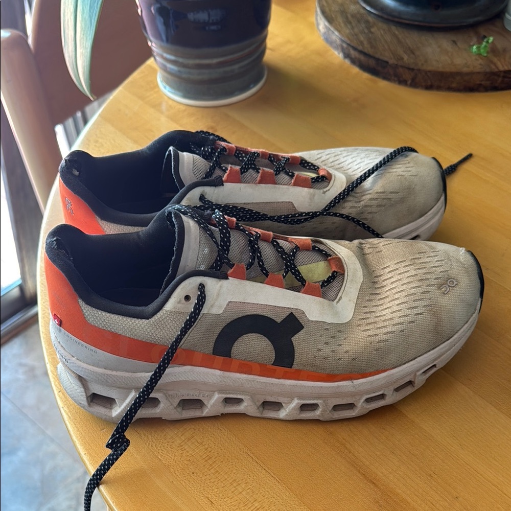 On Cloud Cloudmonster Running Shoes with Orange and Black Accents